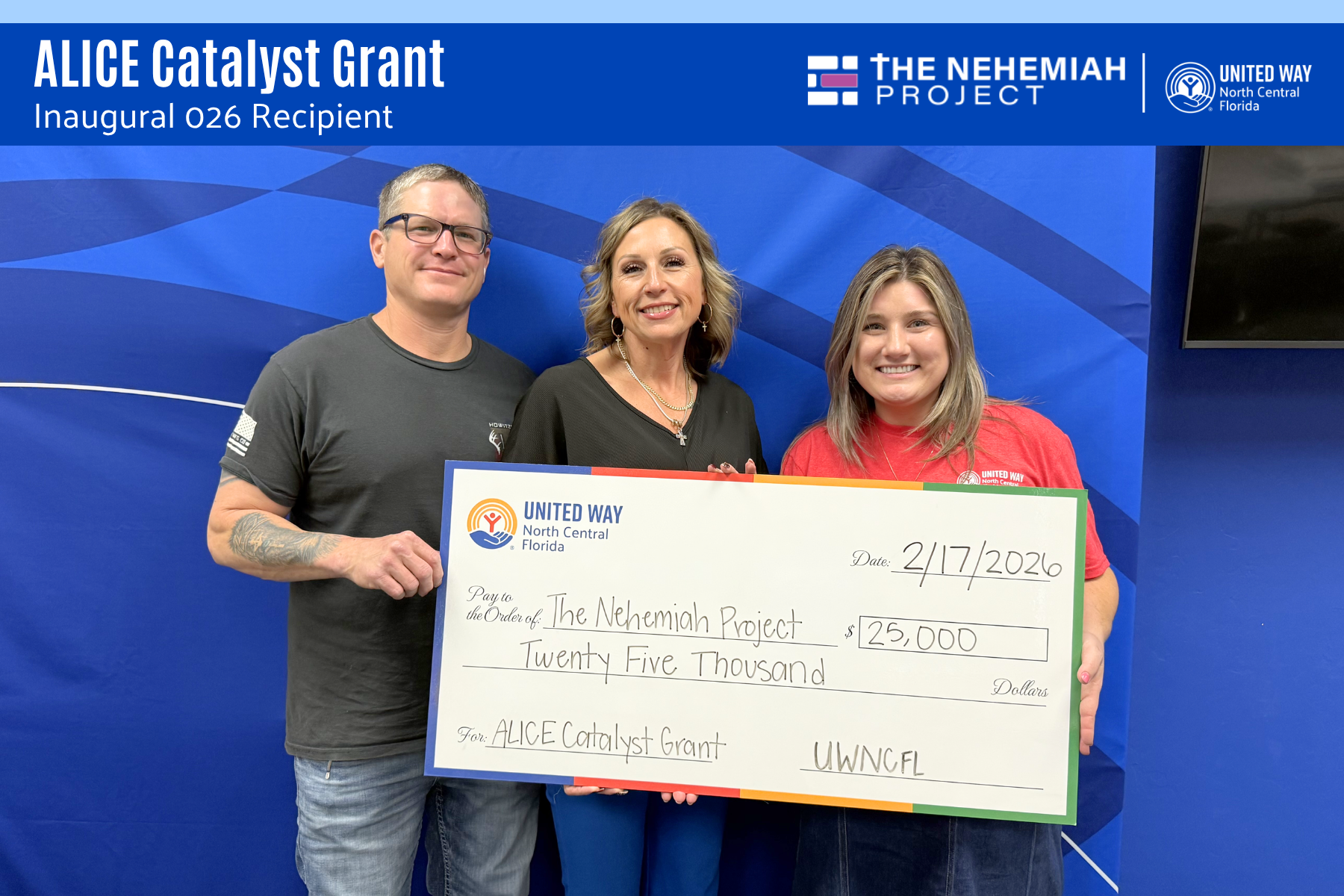 Check presentation photo of United Way staff and The Nehemiah Project staff